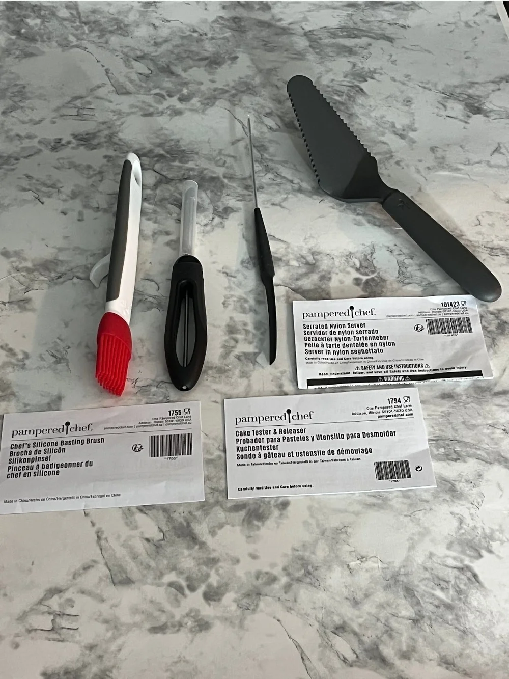 Authentic Pampered Chef 4-piece kitchen utensil lot, all in like-new condition.